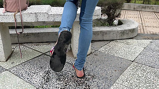 Public Wetting Jeans in Park Near the Beach