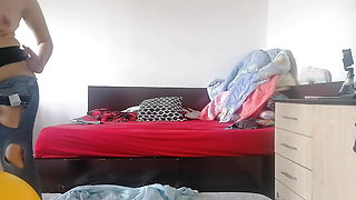 Amateur wife has fun trying on clothes that she cuts. Amateur wife dances naked around the house.