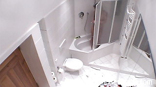 Secretly-filmed amateur blowjob in the bathroom