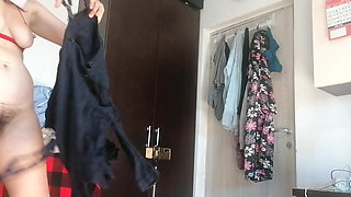 Sexy Latina Having Fun Trying on Clothes and Cutting Them
