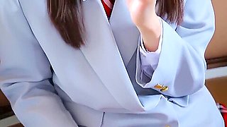 Nishida Natsume sucks a lollipop in school uniform