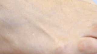 Blonde MILF Plays with a Dildo Using Her Oiled Feet Like a True Foot Goddess