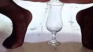 A glass of pee from a mature sexy woman