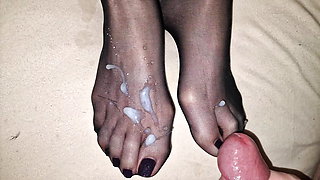 Shiny semen on wife's black nylon feet - black polish pedicure