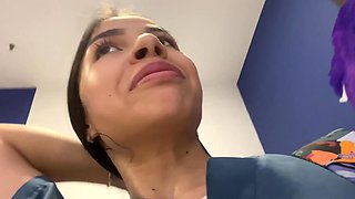 Lustful Latina nurse in uniform masturbates in a public restroom