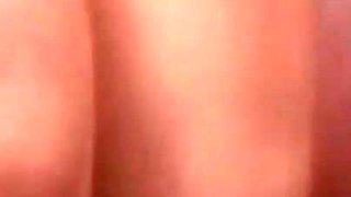 Sexy brunette masturbating with her dildo toy in close up