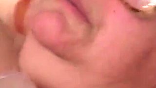 Horny old woman masturbates at home with a dildo