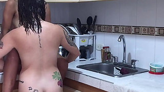 Hot lesbians fuck each other in the living room and in the kitchen.