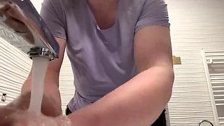 Hot MILF secretly fingers herself with bottle and squirts hard in public toilet