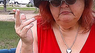 Nurse Vicki Smoking in the Park on a Bench All Dressed up