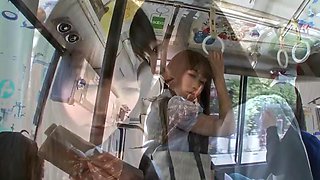 Mature japanese lesbian Emika Sakuragi seducing student Sayo Arimoto on bus scene 1