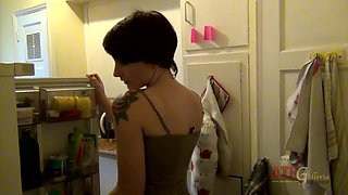 Tattooed Girl Covers Herself with Milk and Masturbates in the Kitchen