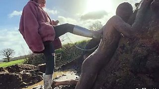 Extreme ballbusting in the mud Miss Eva Ray