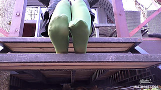 Goddess in Green Pantyhose Teases with Her Feet on the Porch