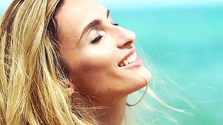 Petite Ukrainian MILF strips at a beach