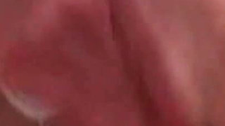 Sexy mature masturbating with her fingers in close up