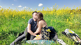 Romantic doggy le in a field