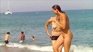 Woman Nude on Public Beach