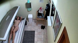 Hairy MILF in solarium