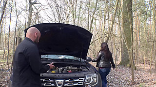 She sucks his cock and he helps her about the car