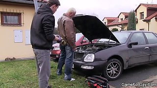 car repair man is seduced by a muscular man