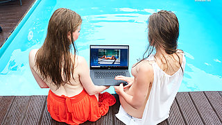 Girlfriends enjoy swimming naked together
