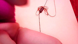 Solitaria undresses to touch her big clitoris