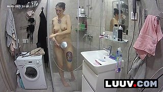 LUUV. Beautiful Alice, used to reality show cameras, enjoys demonstrating her intimate shaving routine in the shower