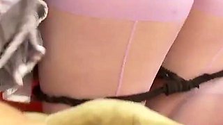 Stacey handles a big cock between her legs.