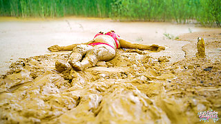 Orgasm in lake of mud - masturbating in clay