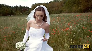 BRIDE4K. Pretty brunette bride fucks a horny shepherd in a summer field