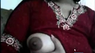 Colleague enjoys playing with her huge tits in office