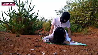 Inexperienced Hooded Asian Duo Smash Outdoors