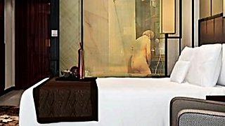 My grandmother is taking a bath at the hotel.