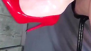 Pale Legs Red Heels and Hard Toe Tapping.