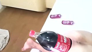 Massive cola bottle is penetrating her hole till she cums