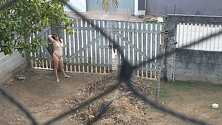 My wife totally naked relaxing in front yard