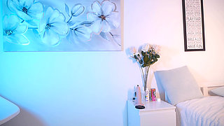 Undresses and puts on white stockings