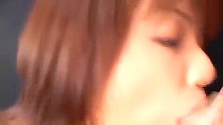 Itsuka doll touches stiffy with feet in fishnets and sucks it