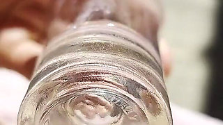 Inserting a Small Cup Into the Wet Pussy