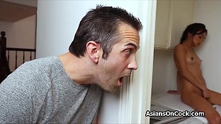 Petite Asian caught masturbating on the washing machine