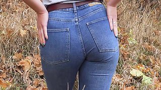 MILF in Blue Jeans Teases Her Amazing Ass Outdoors