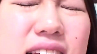 Pale Japanese teen rides toys and cock