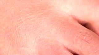 Ebony Girl Gives Her Feet a Massage with a Massage Gun