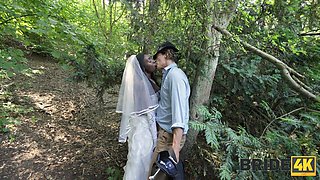 Amazing black girl dressed like a bride has passionate sex with her lover outside in the woods