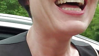 Milf Julie squirts next to the highway and is seen