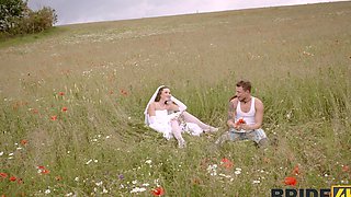 A bride in white satin lingerie has sex with her husband outdoors