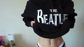 Redhead babe strips, fingers and talks dirty on webcam