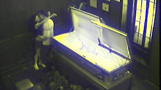 Couple Fucking in Coffin