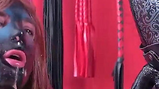 Latex Mistress Verbally Humiliates and Strapons Rubber Sissy Doll. Arya Grander